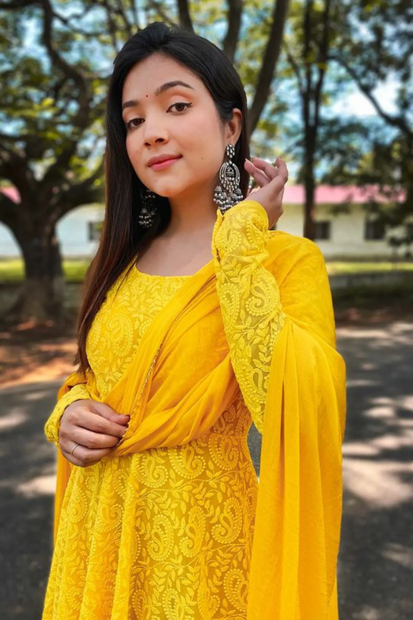 Exclusive Pure Yellow Colored Chikankari Worked Georgette Gown with Dupatta Set